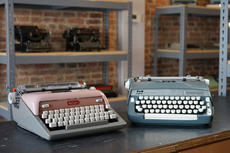 Photo of two Late-Era American Portable Typewriters, the 1958 Royal Futura and the 1968 Smith-Corona Sterling