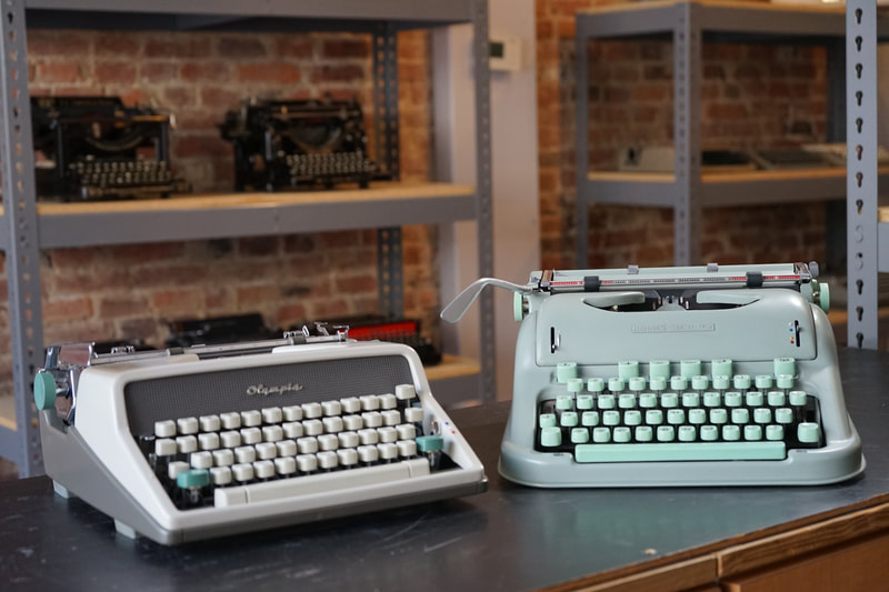Photo of two European Portable Typewriters, the 1962 Olympia SM7 and the 1962 Hermes 3000